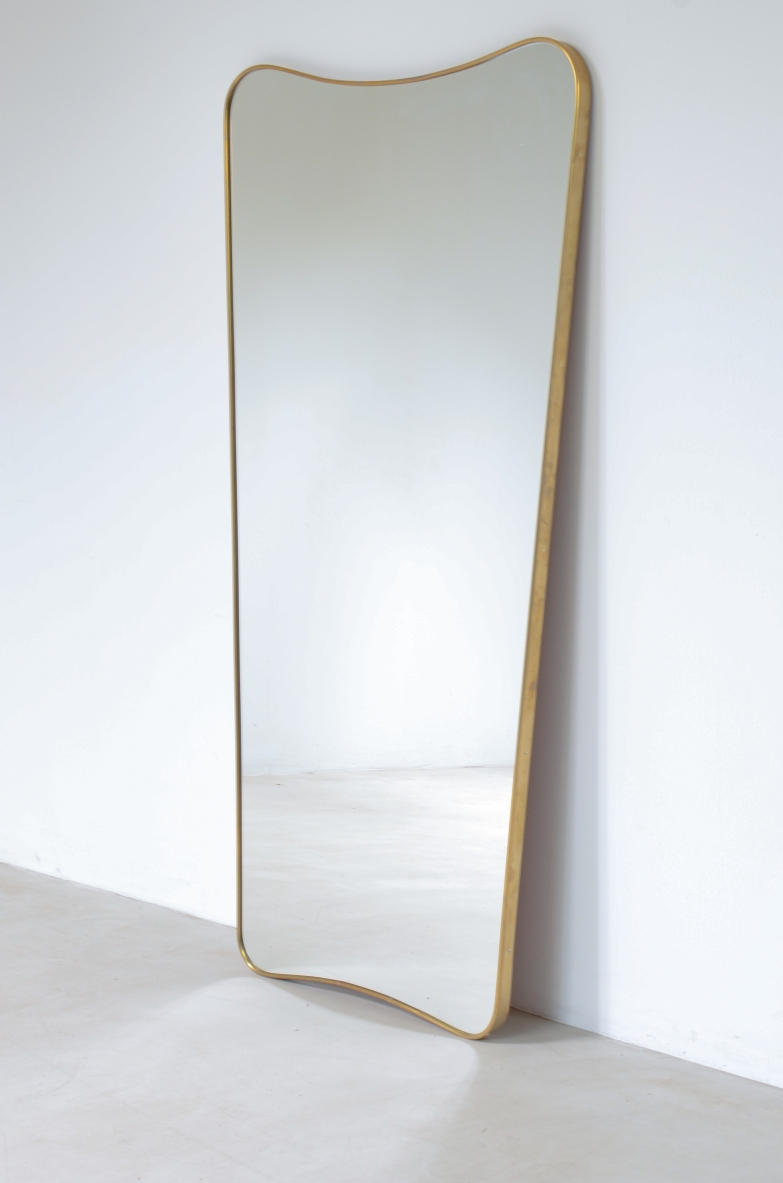 Large mirror with brass frame. This large mirror is custom produced after his original design by Ponti in the 1950's.