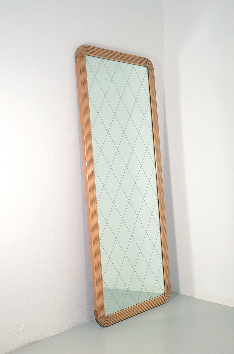 Large 1930's mirror with grinded wood frame and geometrical engravings.
