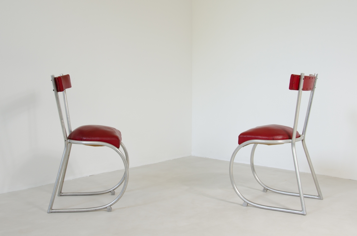 Pair of Italian1930's chairs made of curved metal and seat and back with original upholstery.