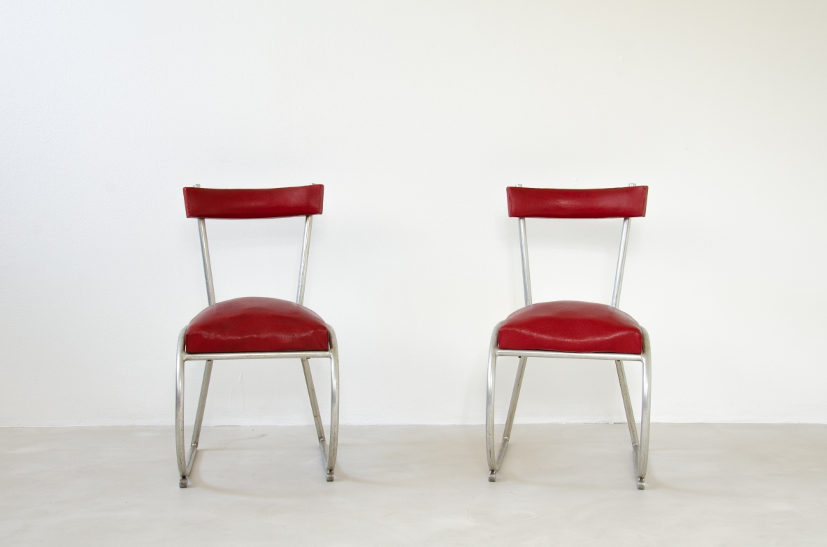 Pair of Italian1930's chairs made of curved metal, seat and back with original upholstery. Prod.Cova Milano 1930's.