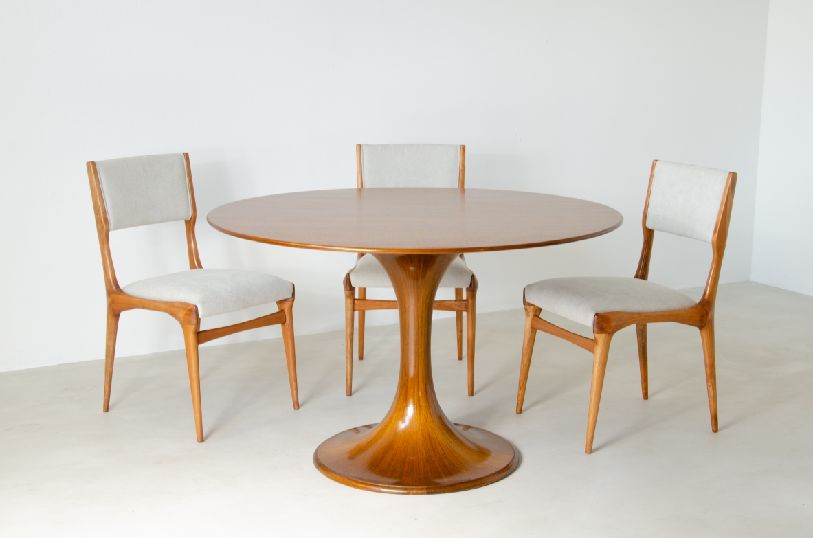 Luigi Massoni, elegant round table "Clessidra" model for furniture. Walnut wood, Italy 1959.