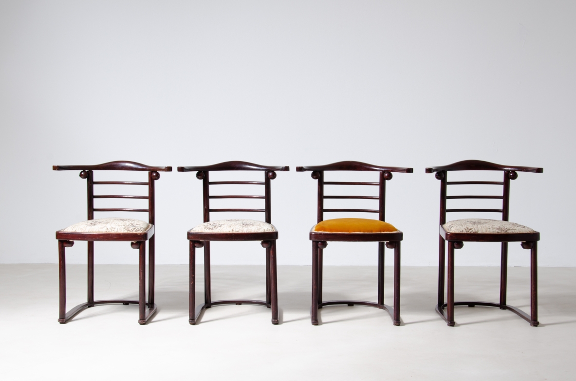 Josef Hoffmann (1870-1956)  Rare set of four chairs in curved polished wood and upholstered seat.  Manufactured by JJ.Kohn, Vienna, 1907.
