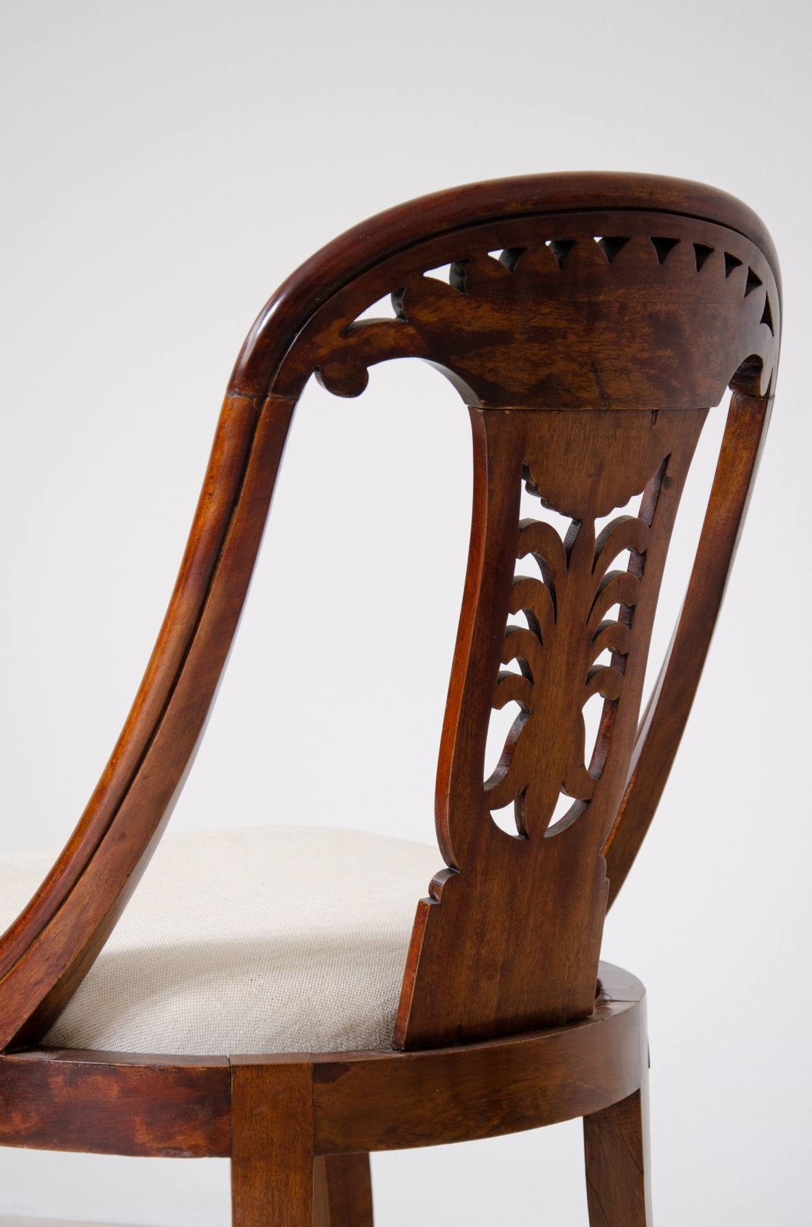 Rare set of 12 antique walnut cockpit chairs in walnut with carved back.  Charles X period,  Northern Italy, around 1830s.