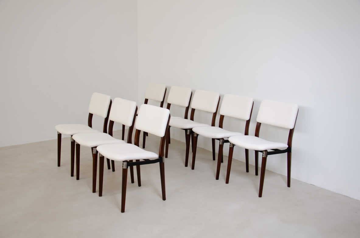 Eugenio Gerli (1923-2013)  Rare set of 8 chairs with structure in rosewood, metal and steel details.  Tecno Manufacture 1960.