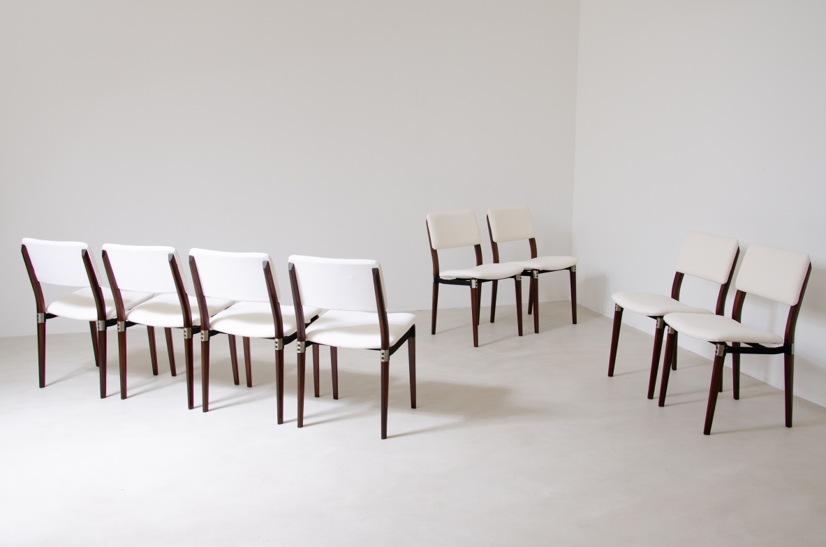 Eugenio Gerli (1923-2013)  Rare set of 8 chairs with structure in rosewood, metal and steel details.  Tecno Manufacture 1960.