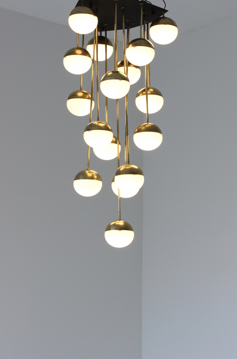 Large 18-light chandelier with brass structure and opaline glasses. Stilnovo production, 1960's.