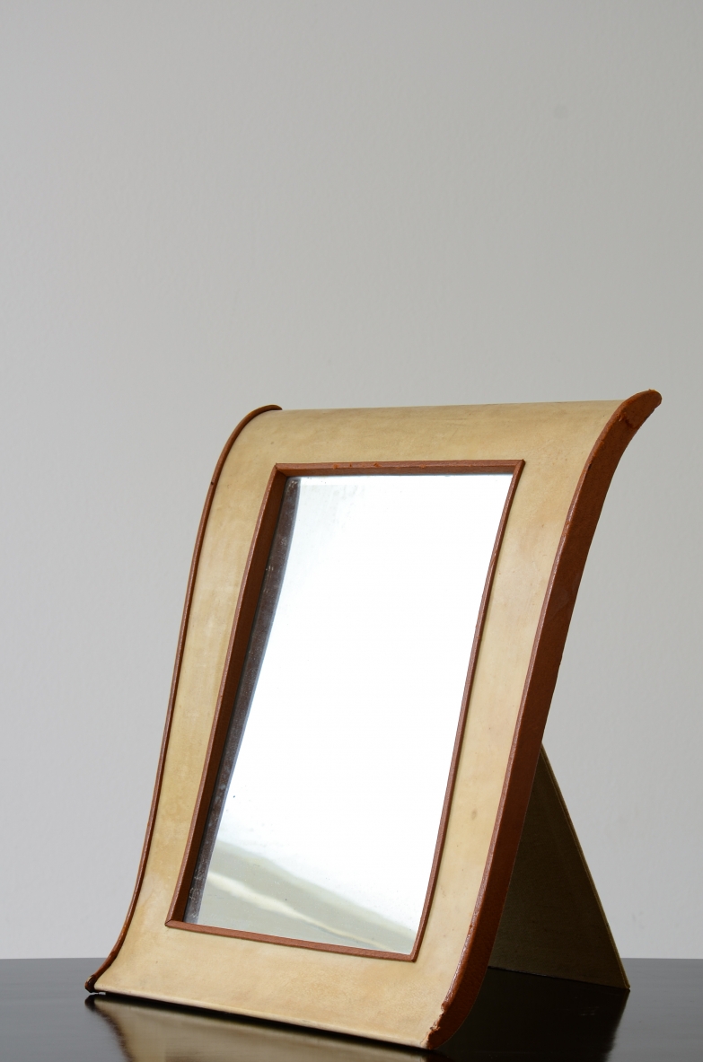 Table mirror with parchment frame.  Italian manufacture,1940's.
