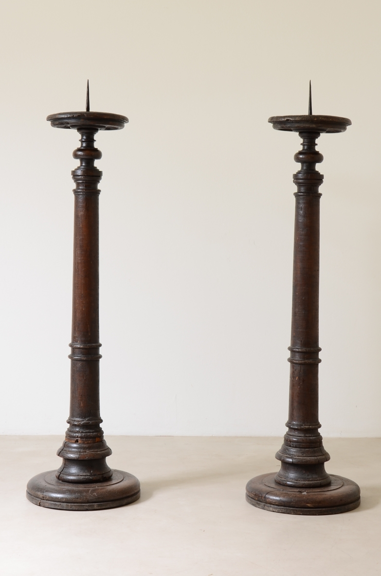 Pair of large turned wooden torch holders.  Northern Italian manufacture, 17th century.