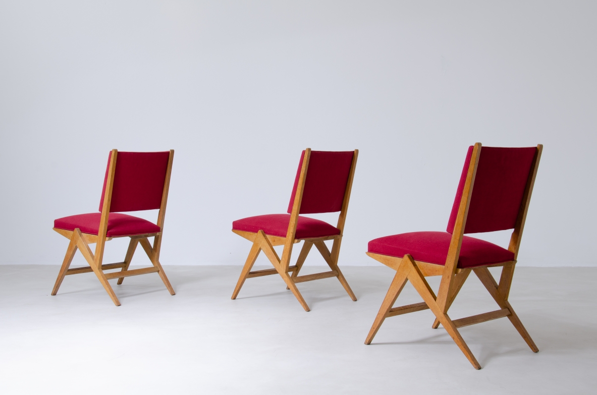 Set of six chairs in Oak with red fabric upholstery, France, 1950's.