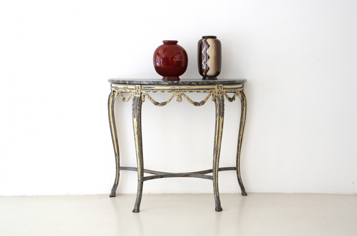 Luis XVI console table in painted thin carved wood, France 1770's.
