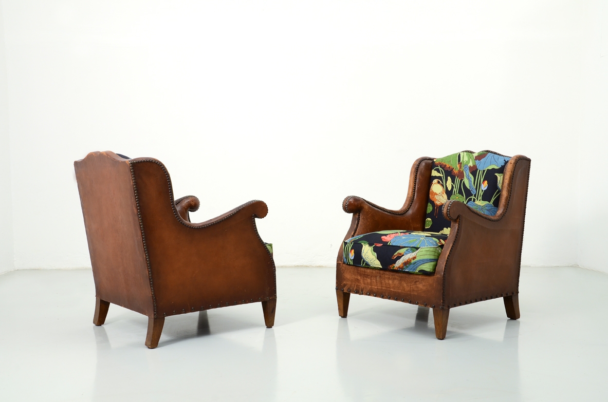 Pair of 1930's club armchairs.
