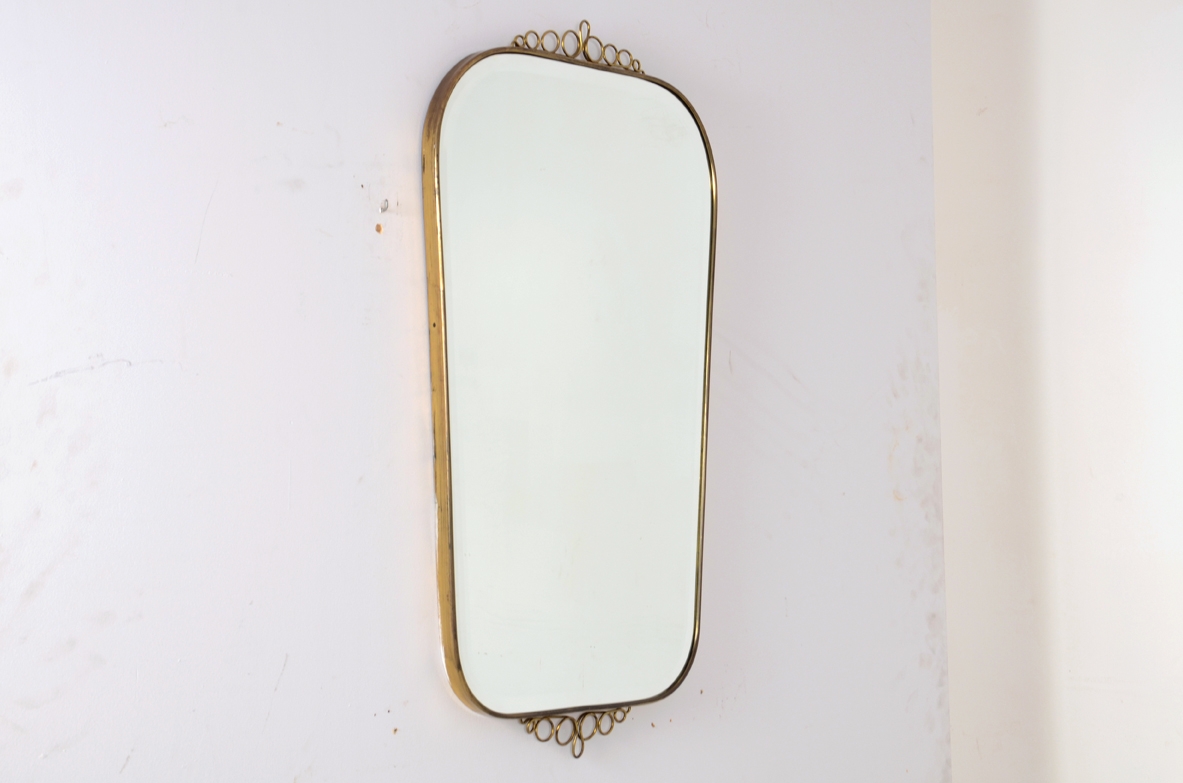 1950's Italian mirror with brass frame.