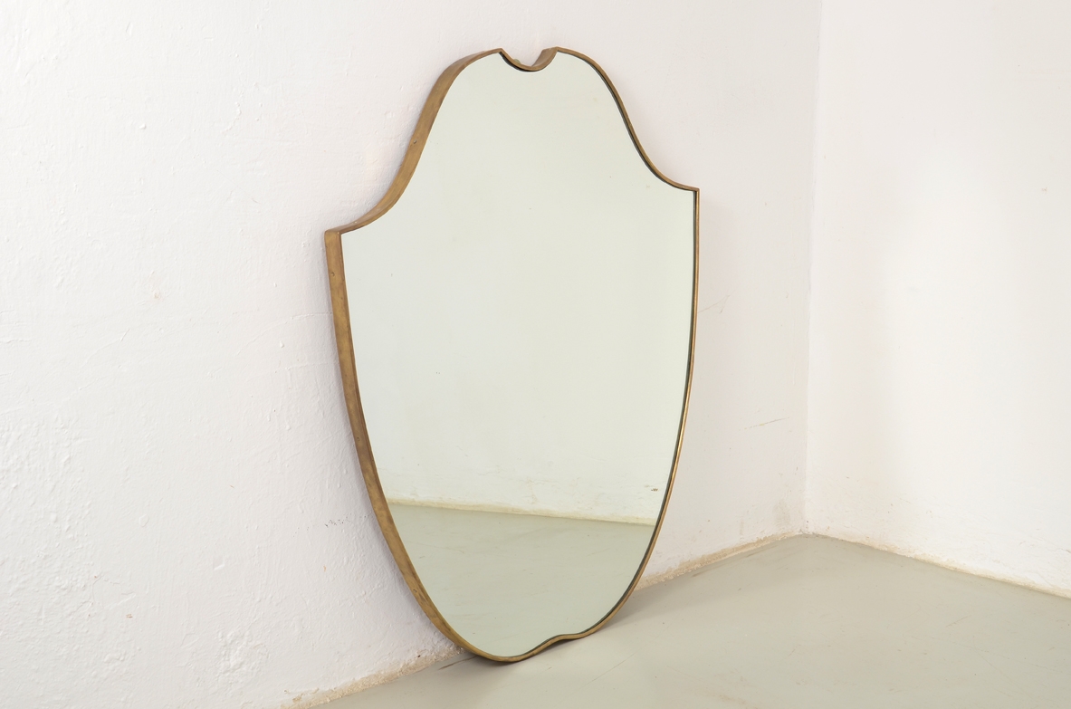 Italian 1950's brass framed mirror.