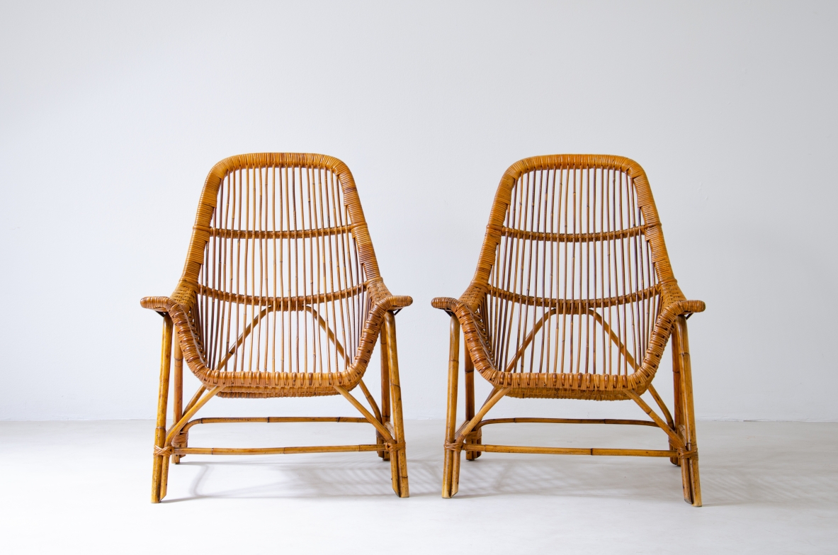 Pair of outdoor lounge chairs in wicker and bamboo.  Italian manufacture, 1950s.