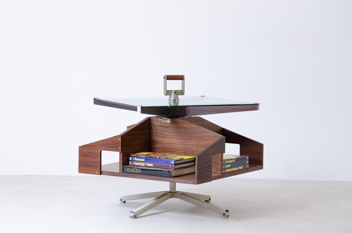 Ico Parisi (1916-1996)  Low table in walnut with swivel shaped structure and swivel glass top with steel and wood handle.1958