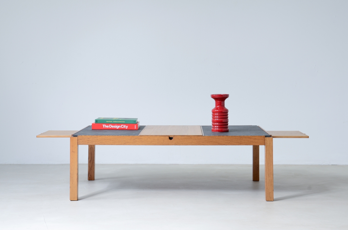 Low table with wooden and slate top, one compartment under the central wooden top and two side shelves.  Italian manufacture around 1960s.