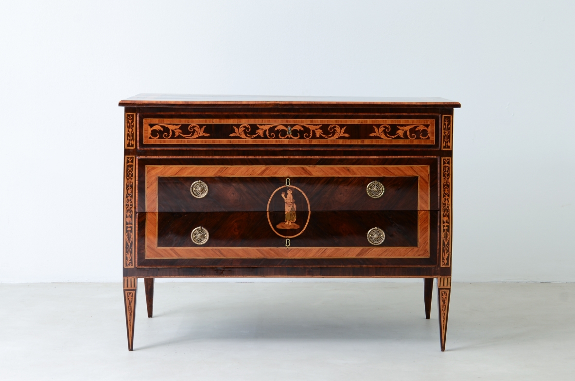 Furniture inlaid with precious woods. Three drawers with brass handles and vents.  Italian manufacture, Lombardy, Louis XVI era, around 1780