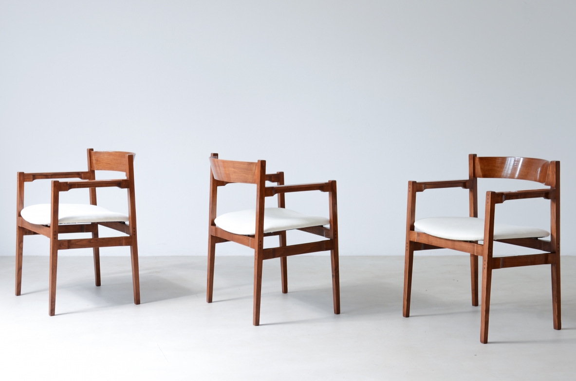 Gianfranco Frattini (1926-2004)  Rare set of 12 armchairs with wooden structure and original sky upholstery.  Italian manufacture, ca. 1960.