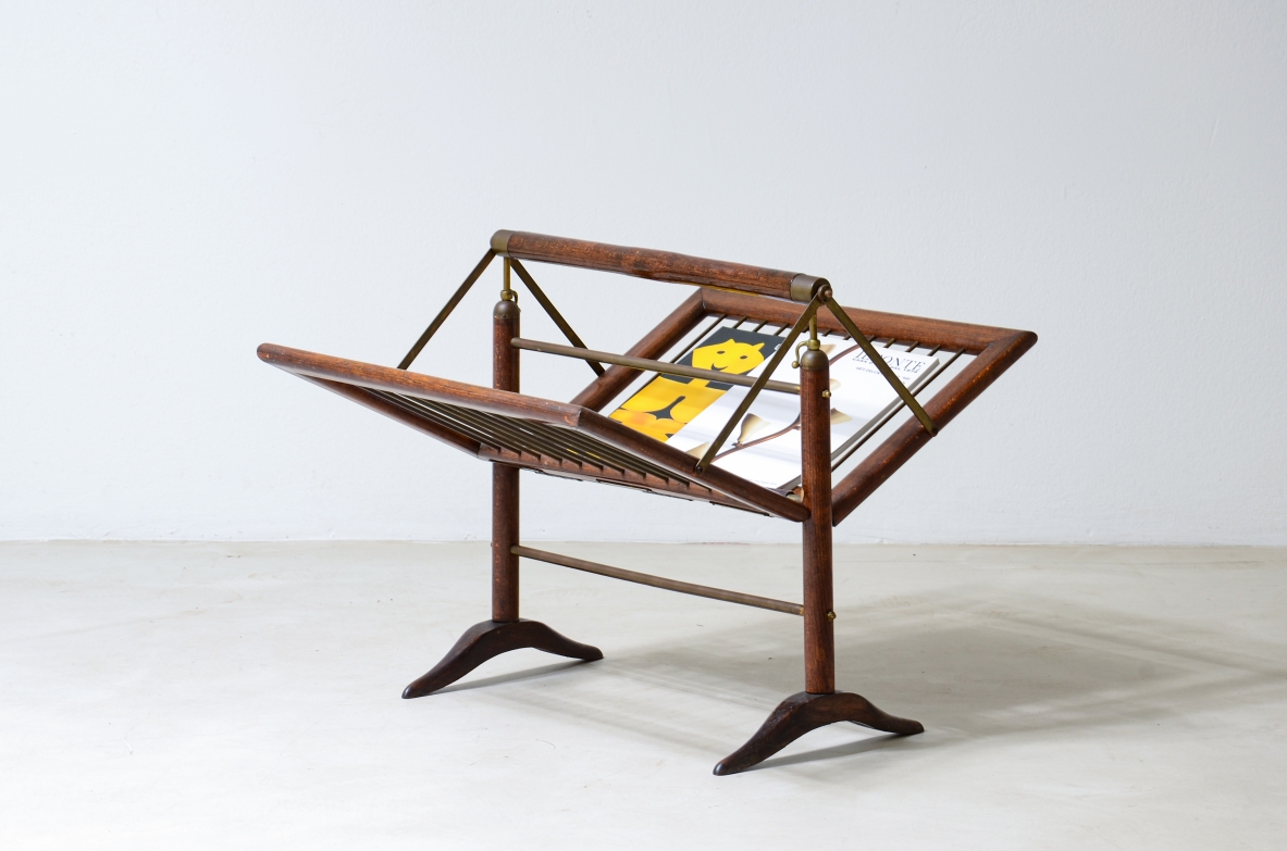 Book magazine rack in wood, brass and leather.  Italian manufacture, ca. 1950.