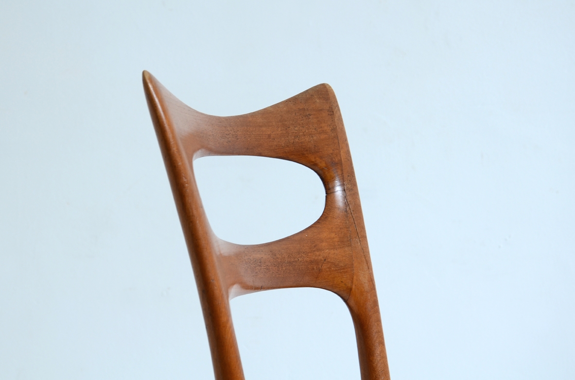 Elegant group of six cherry wood chairs with upholstered seat.