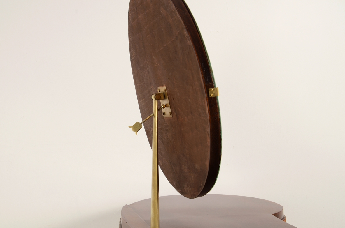 Italian 1950's Console table with adjustable round mirror based on thin elegant legs with brass tips.