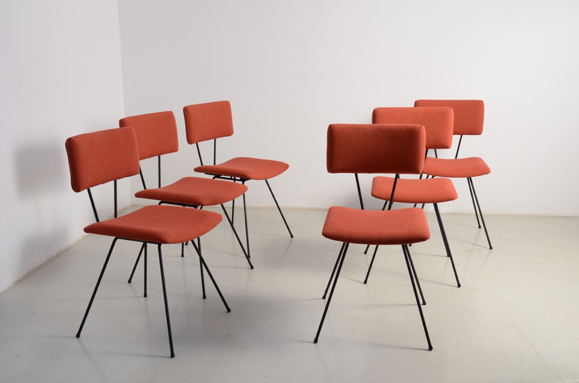 Augusto Bozzi, set of six chairs in metal work with upholstered seat and back.  Prod. Saporiti, 1950's. Tag of the producer.