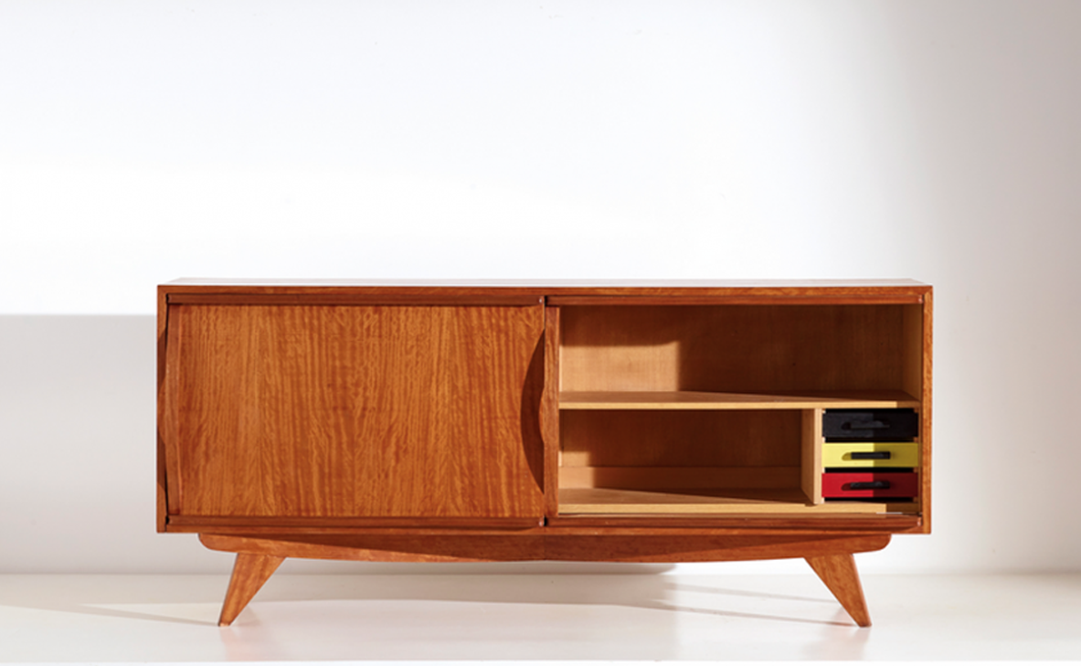 Sideboard in light wood with two sliding doors and very nice handles, drawers and shelves inside. Scandinavia 1960's.