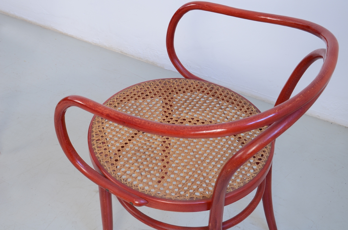 Pair of 1970's armchairs in bent red lacquered wood with Vienna straw hand made seat, prod.Bertoletti Torino.