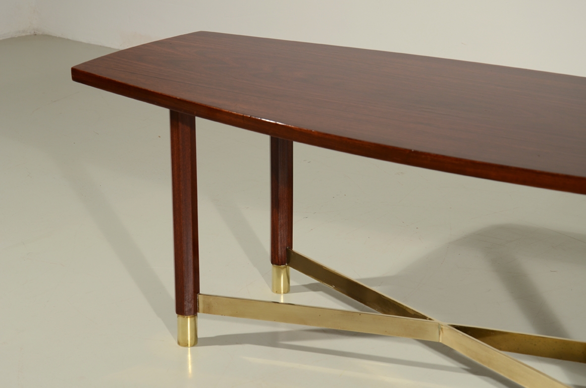 Very elegant small coffee table in macassar wood with a nice brass cross on bottom, Italy 1950's.