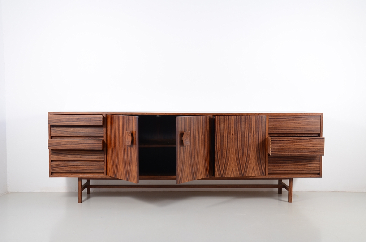 Splendid Italian 1960's sideboard in exotic wood with doors and drawers on both sides,