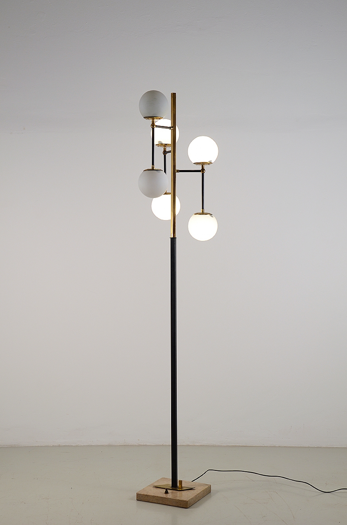 Floor lamp with metal structure and six spherical diffusers in opaline glass, 1950s. 
