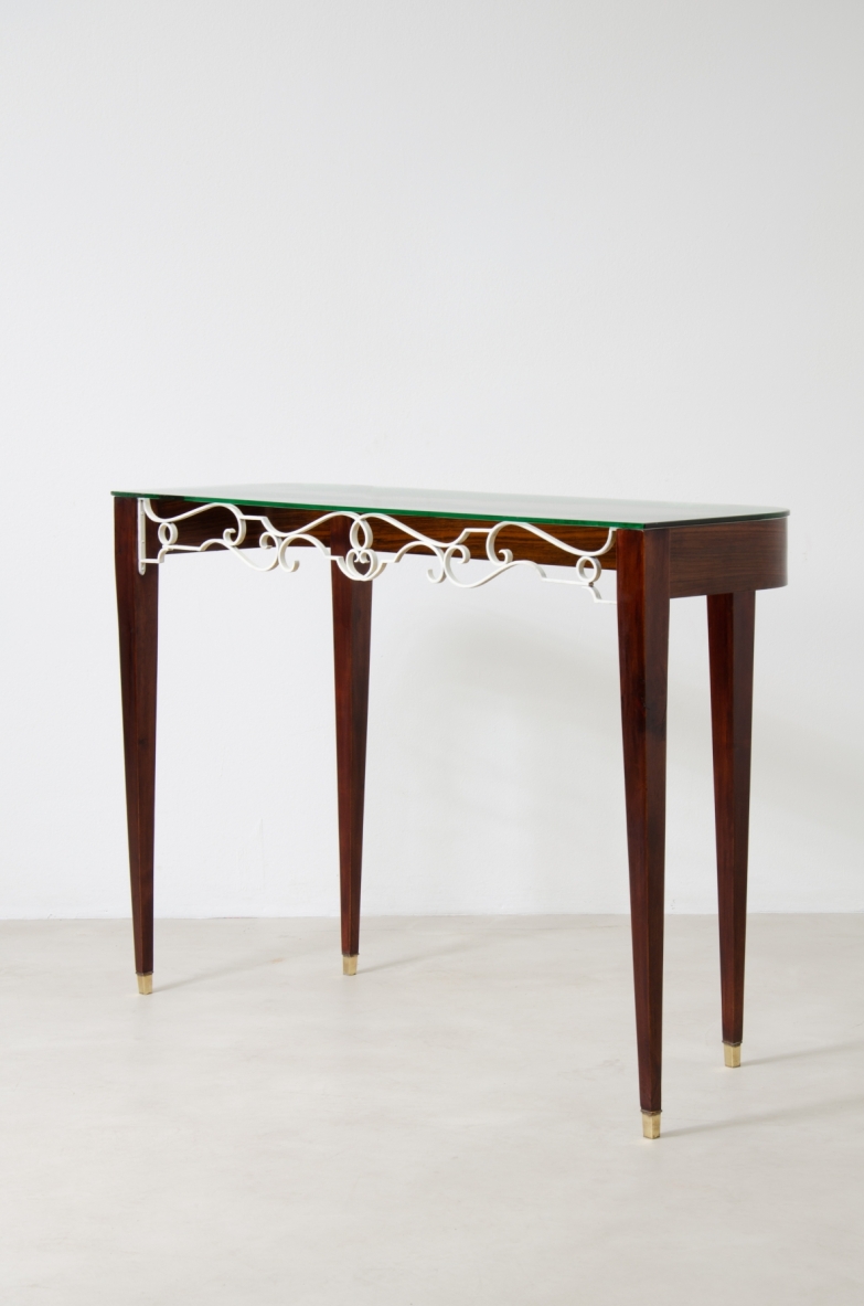 Fabrizio Clerici, rara console in palissandro con fronte in ferro battuto e  laccato, piano in cristallo, 1950ca.