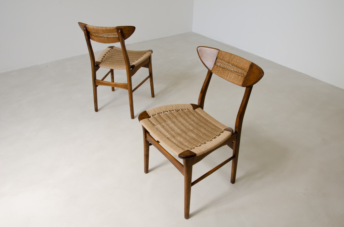 Set of 8 dining chairs with seat and back in woven straw. Scandinavia, 1960's.
