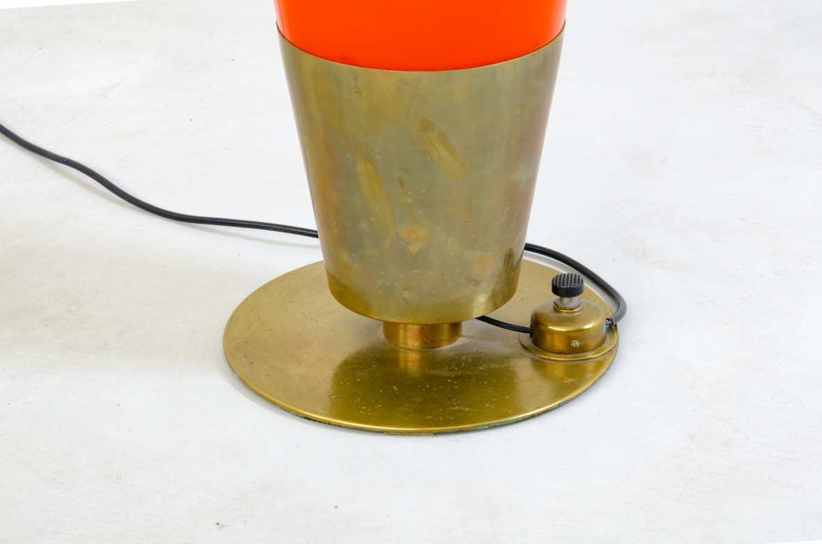 Arredoluce, rare 1950s floor lamp in orange coated glass, with round brass base.