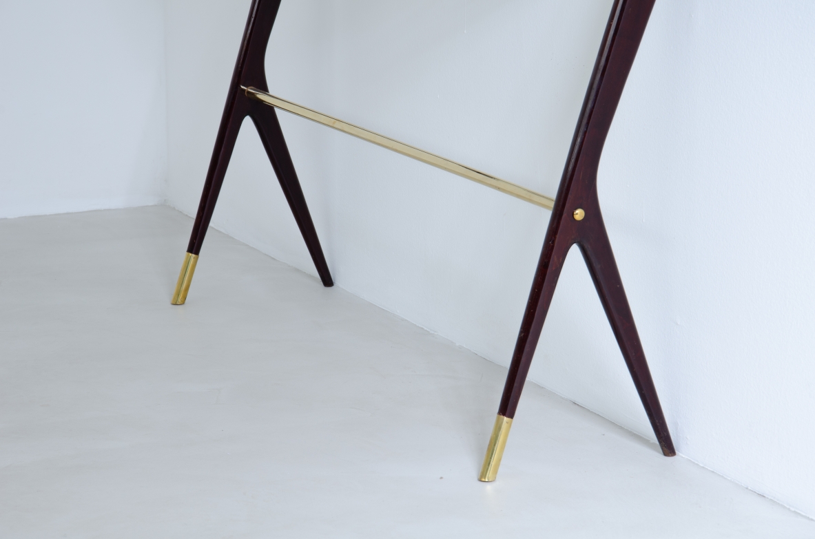 Elegant console table in stained wood with crystal glass top. Italy, 1950s