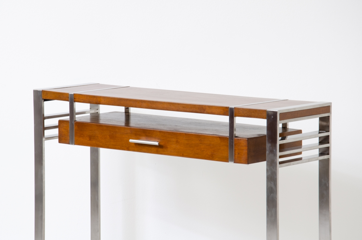 Modernist console table in steel and wood with one drawer.  France, 1935.
