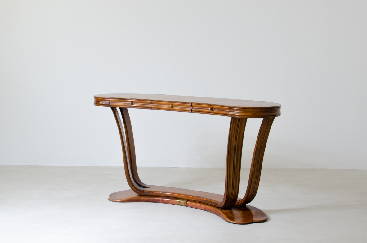 Osvaldo Borsani, elegant table / console in lacquered wood, with glass top and brass structure. Manufactured by Arredamenti Borsani, Italy 1940ca.