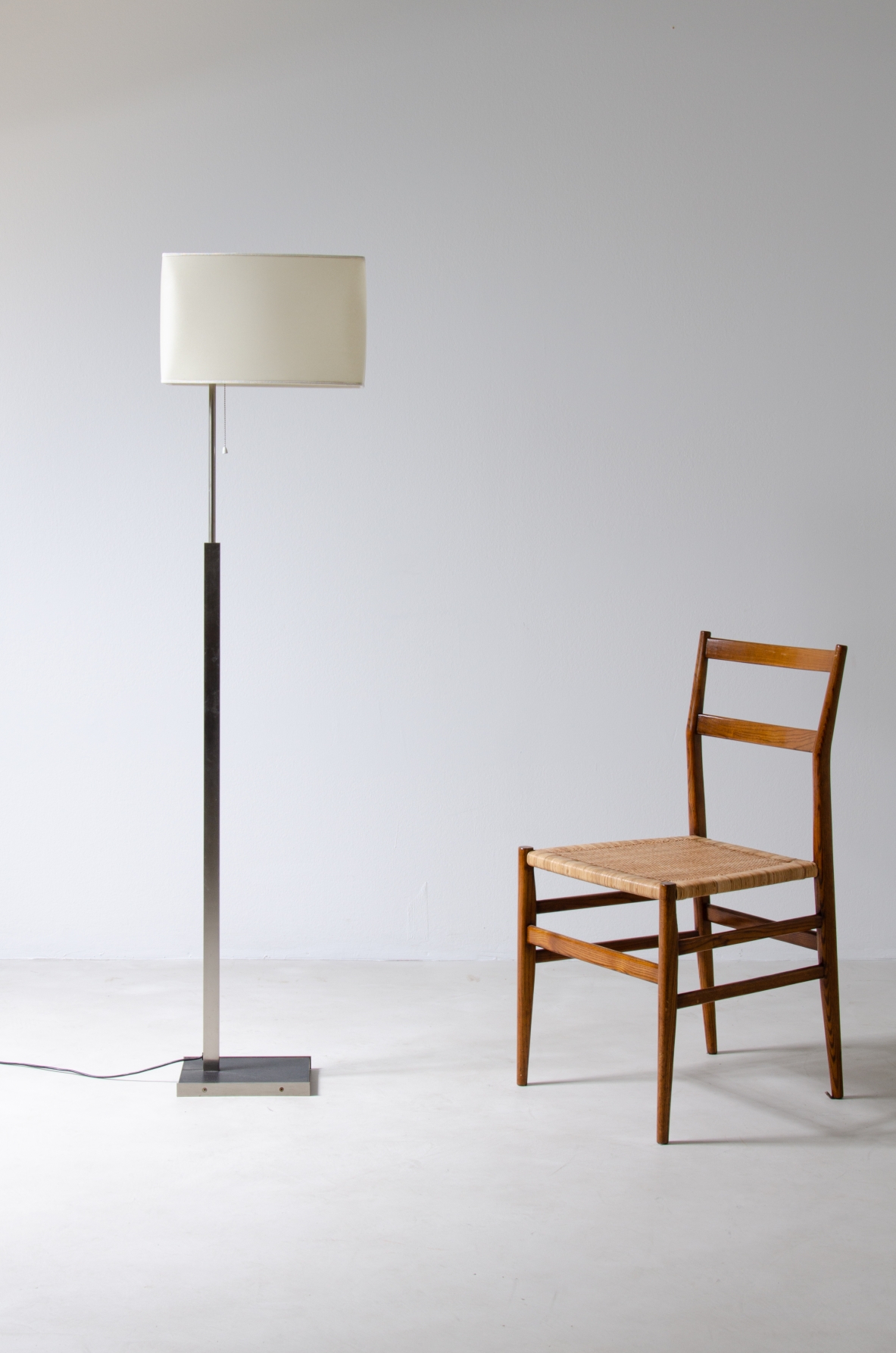 Stilnovo, floor lamp in satin steel and parchment lampshade.  Manufacturer's stamp inside.  Stilnovo, 1960ca.