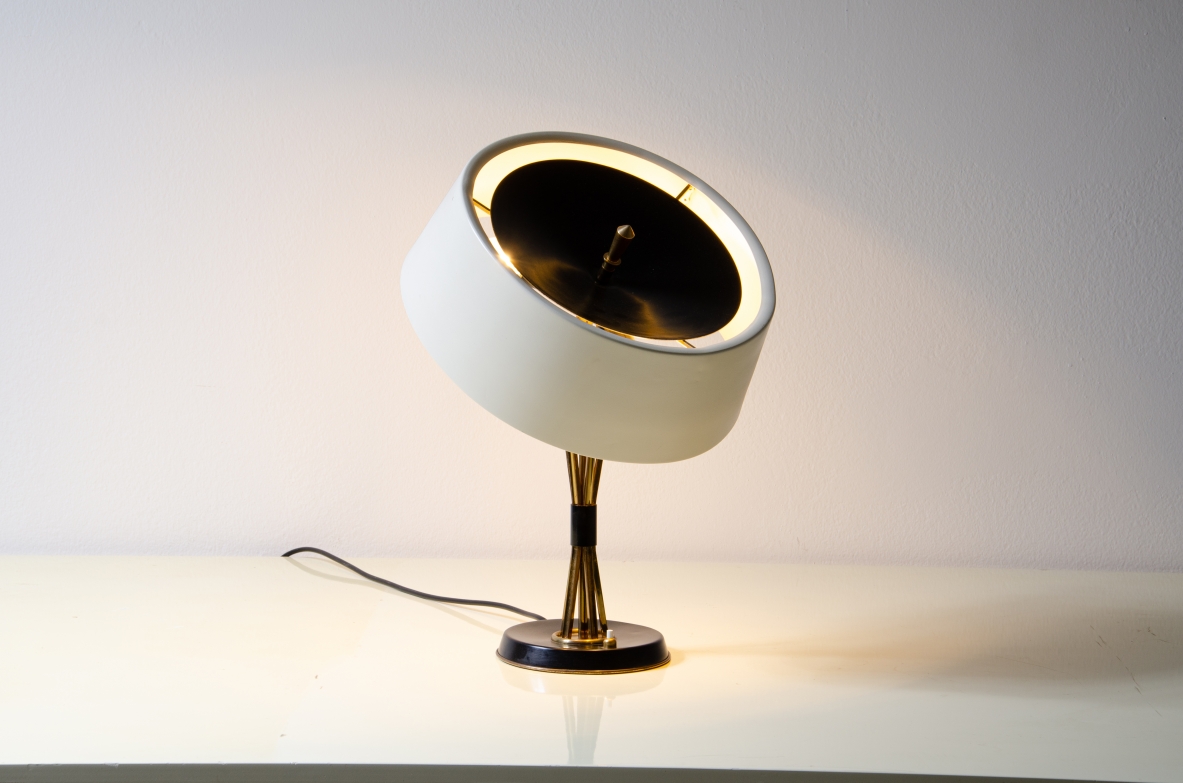Giuseppe Ostuni, metal and brass table lamp with adjustable shade in all directions.  Oluce 1950s.