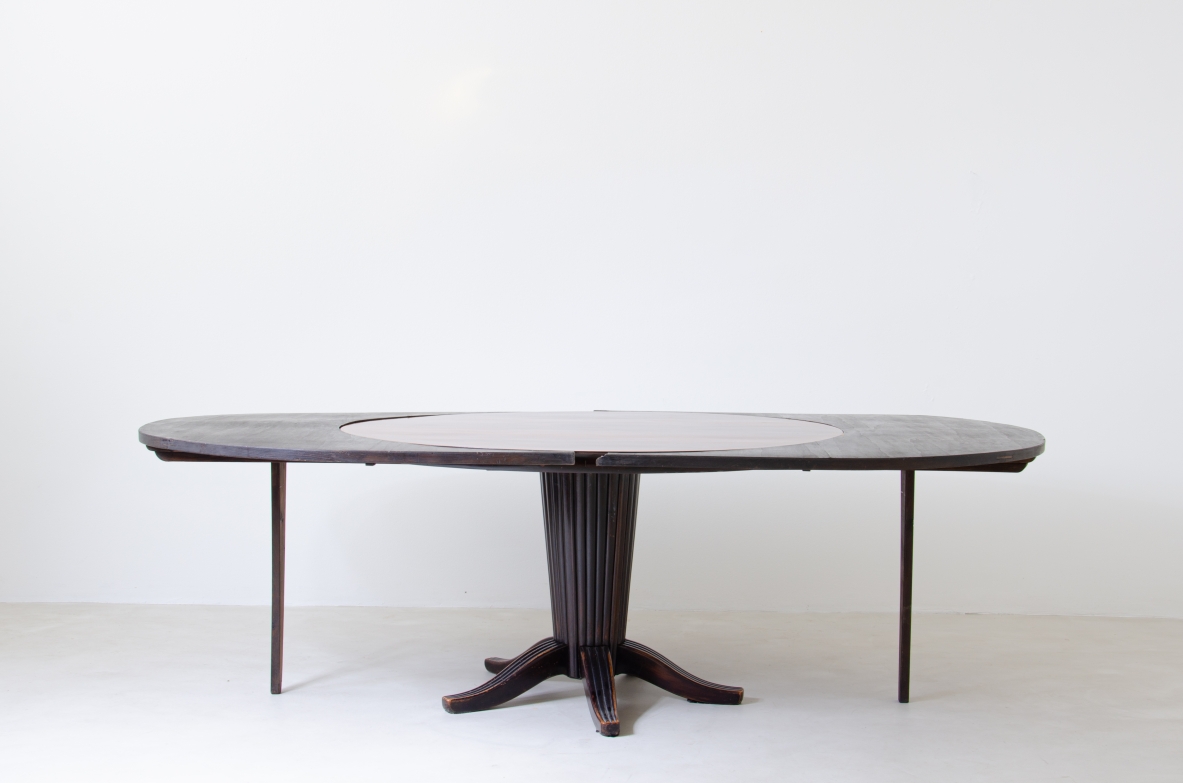 Atelier Borsani, 1940's dining table in macassar and walnut with extensions.