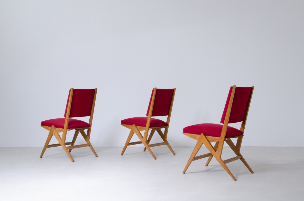 Set of six chairs in Oak with red fabric upholstery, France, 1950's.