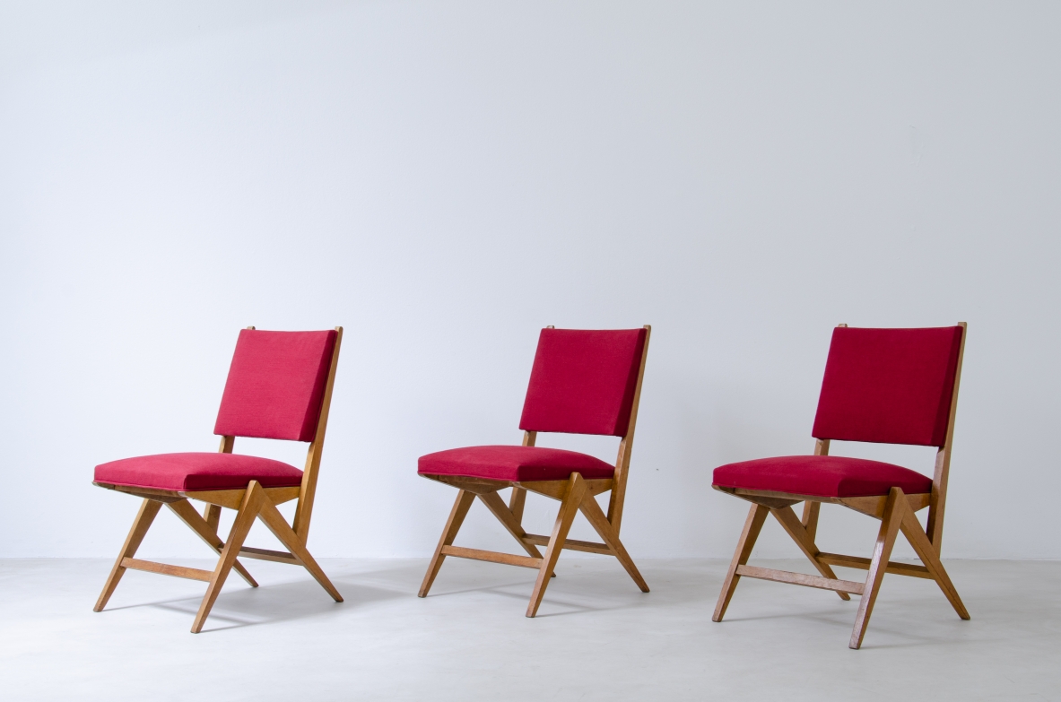 Set of six chairs in Oak with red fabric upholstery, France, 1950's.