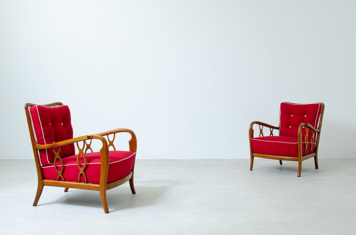 Pair of cherry wood armchairs with ribbon motif on the sides. Seat and back in padded fabric.  Attribution Paolo Buffa 1930s.