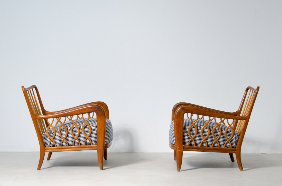 Paolo Buffa (1903 - 1970)  Pair of rare armchairs with ribbon motif in oak wood and upholstered fabric.  Italy, 1940's.