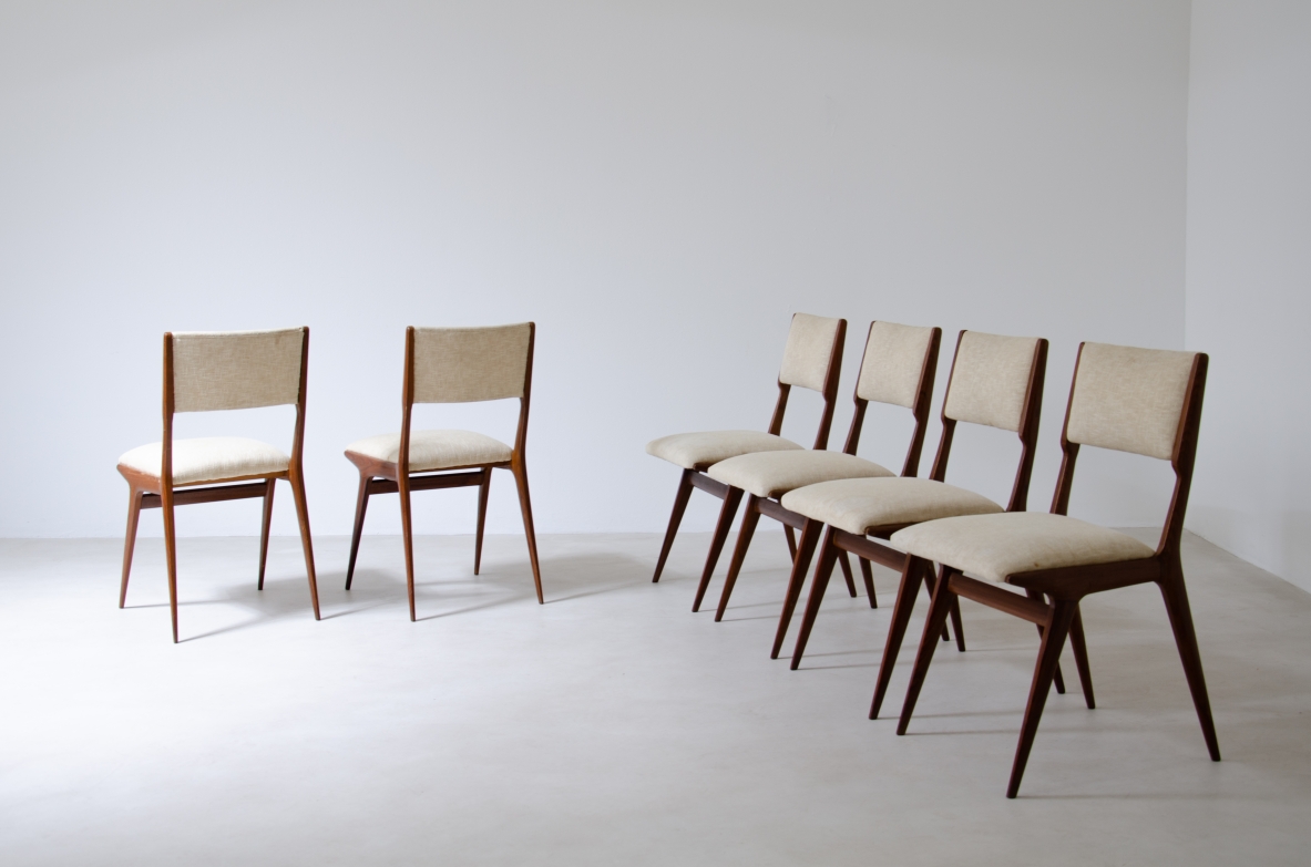 Carlo de Carli (1910 - 1999)  Set di sei sedie Modello 158 con seduta e schienale imbottiti.  Prod. Cassina, 1953-1954