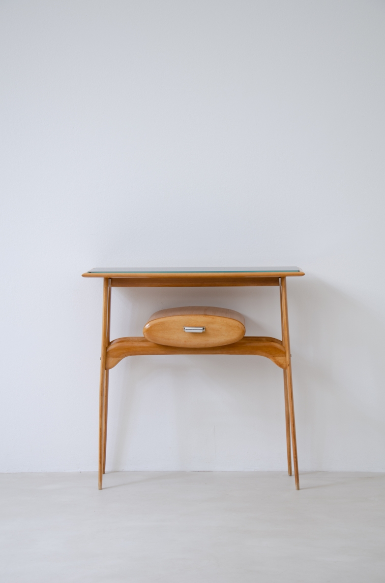 Small console in blond wood with opaline glass top and oval drawer.  1950's Italian manufacture.