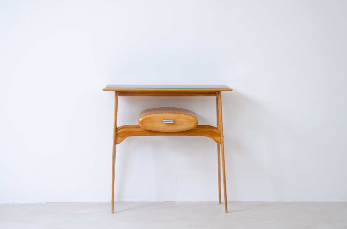 Small console in blond wood with opaline glass top and oval drawer.  1950's Italian manufacture.