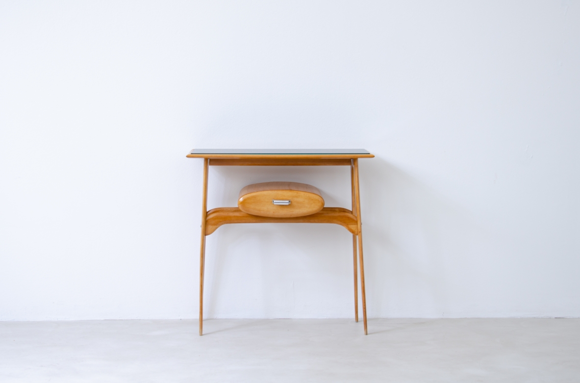 Small console in blond wood with opaline glass top and oval drawer.  1950's Italian manufacture.