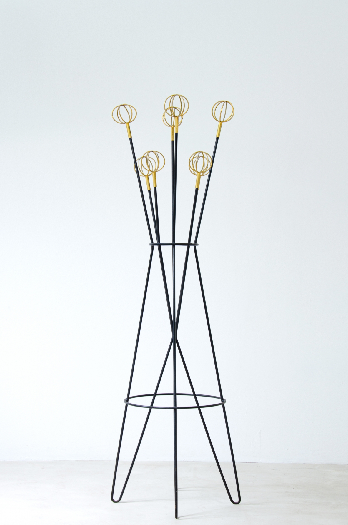 Roger Feraud. Rare clothes hanger in metal and brass. French manufacture, 1950
