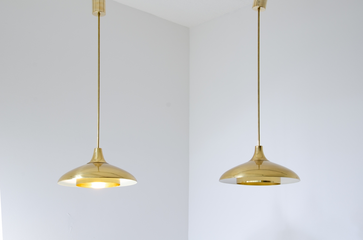 Coppia di lampadari in ottone.  Prod. Bergboms, Svezia 1960ca. Coppia di lampadari in ottone.  Prod. Bergboms, Svezia 1960ca.